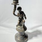 الطفل الصامت (Putto/Cherub)